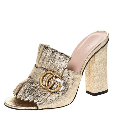 gucci mules gold|Gucci marmont fringe mules.